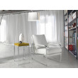 Fauteuil capitonné avec structure en acier inoxydable