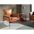 Fauteuil rembourré en cuir marron et pieds en acier noir